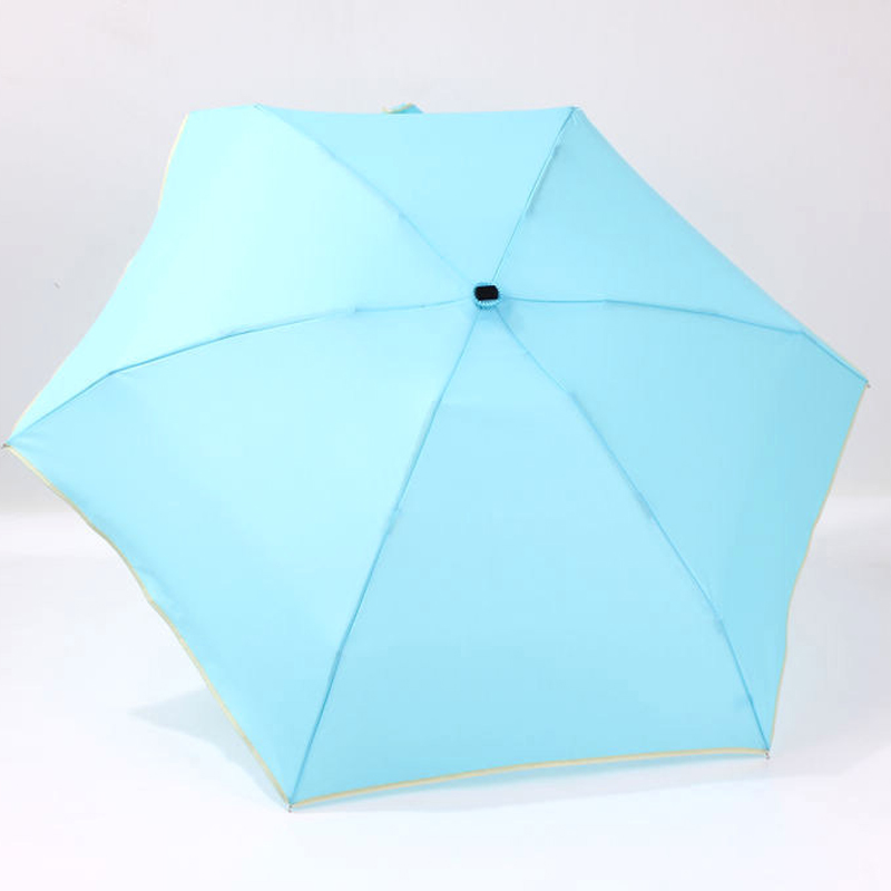 blå mini paraply för väska