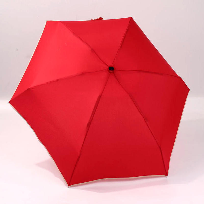 Små 5 vikta röda mini-fickparaply