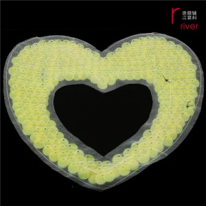 Orange hjärtformad paljett