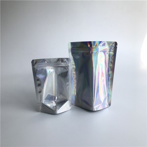 Återförsäljningsbar genomskinlig genomskinlig front Holografisk Stand Up-påsar Laminerade plastkosmetiska blixtlåsspåsar Förpackning i lager