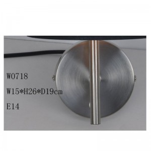 vägglampa med laserskuren tygskärm