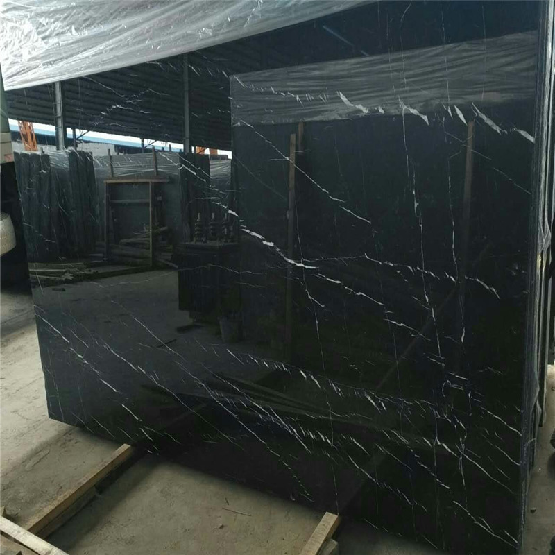 Nero Marquina Marble i vit rand