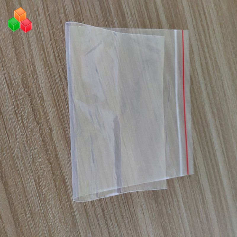 Fabrikspris anpassad utskriftsstorlek återanvändbar tydlig trycktätning plast PE PP zip-lock förpackningspåse för mat / plagg