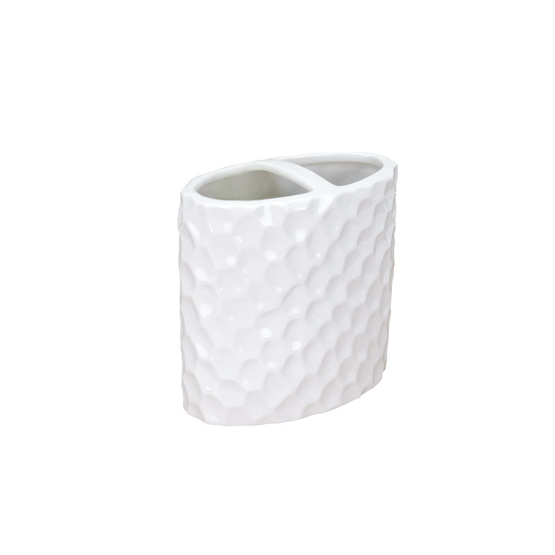 Vit keramisk ansiktsskuren badrumstillbehör