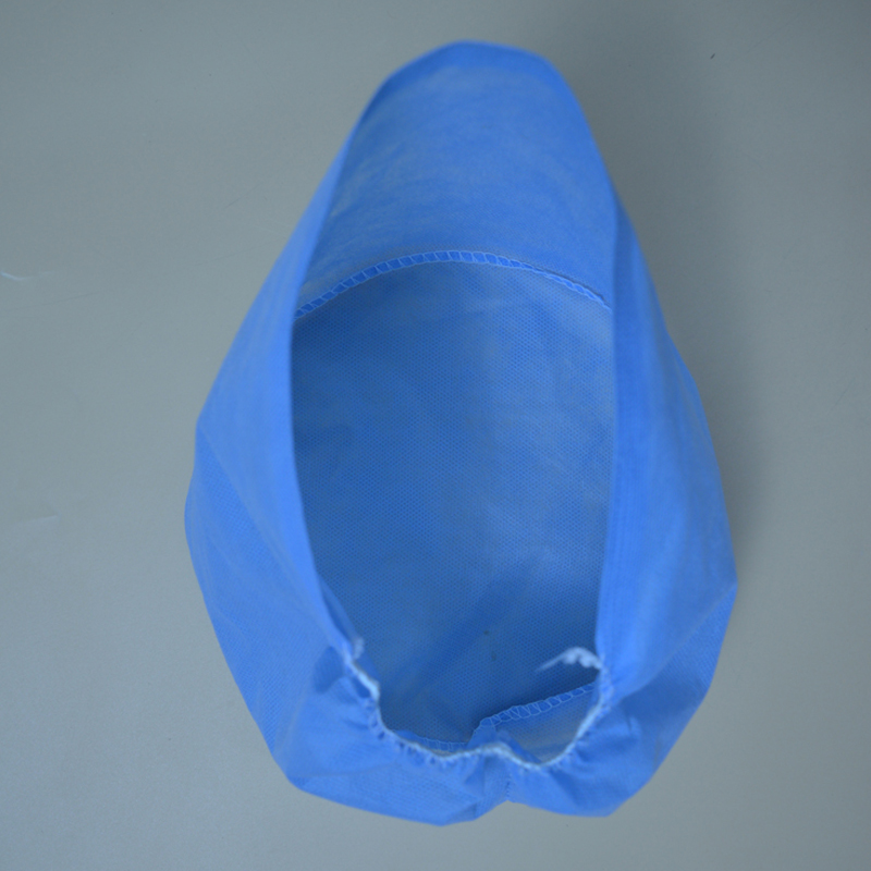 Engångs kirurgisk mössa