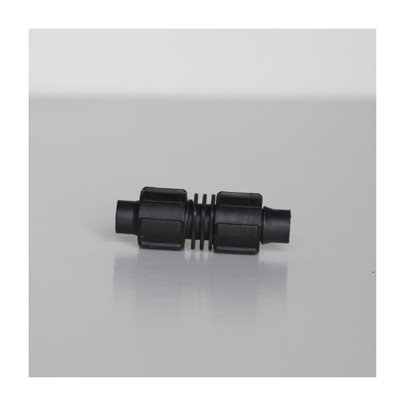 Lockanslutning för dropptejp/rör