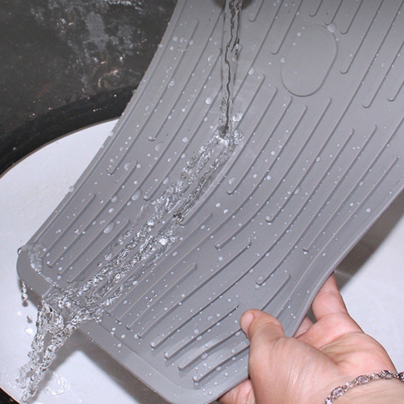 Rektangulär knapp för att hålla dräneringsplattan