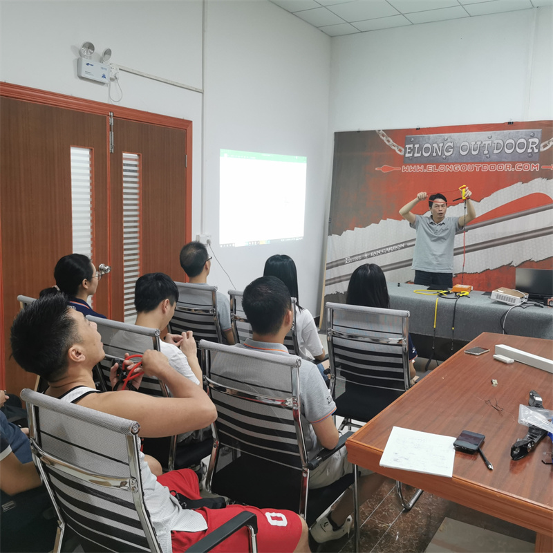 Elong utomhus lanseringsmöte för bågskytte stretchband