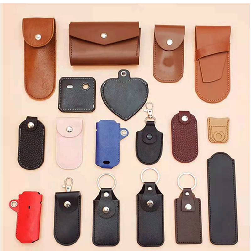 Lädernyckelspänne, USB -läderfodral, olika små läderföremål, läderplånbokskortfodral