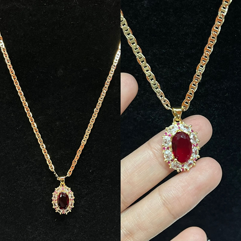 Royal Ruby Halo -halsband med diamant & Rosa safir accenter på en 14k guldkedja