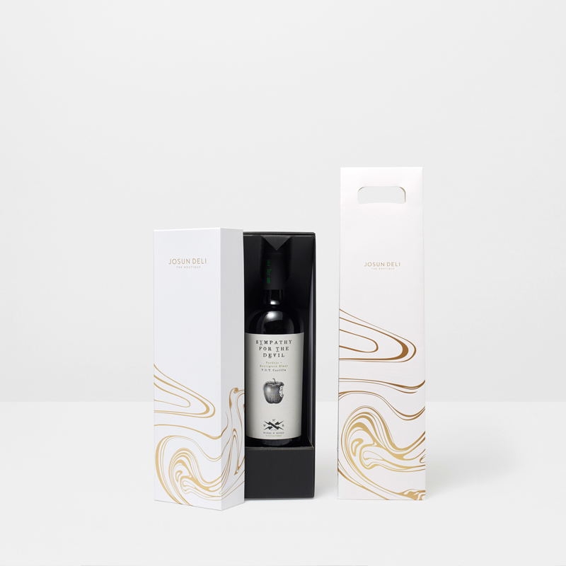 Gyllene minimalistiska presentförpackning