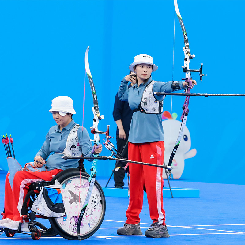 Nika bågskytte recurve bågar stödjer de paralympiska spelen